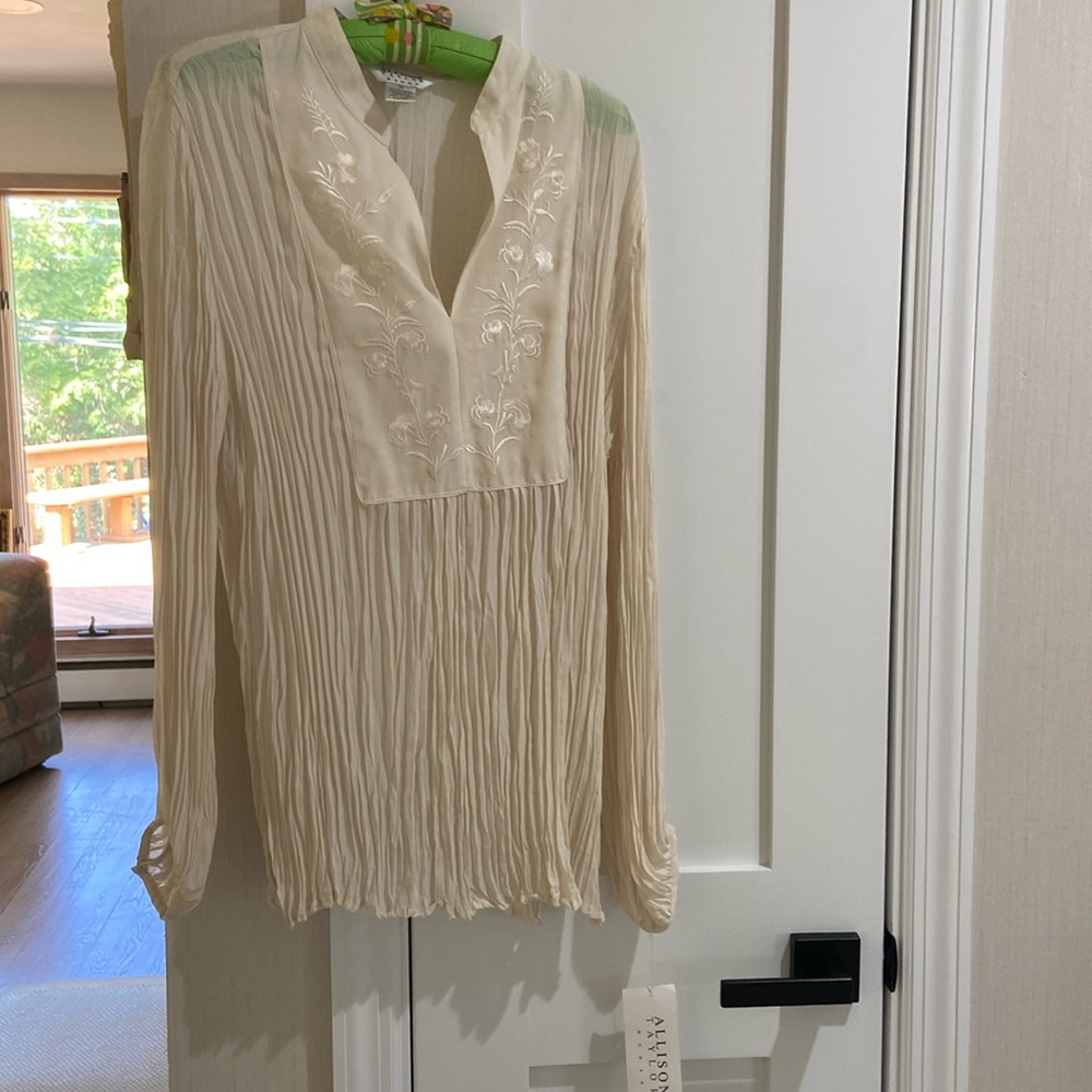 Crème color woman’s blouse